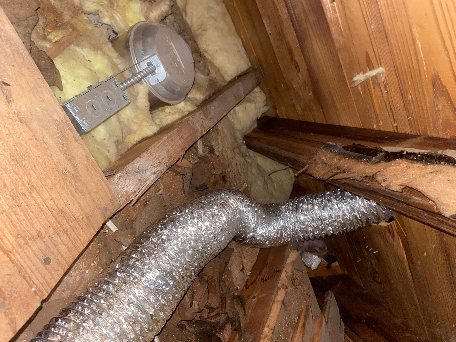 worn attic insulation and vents